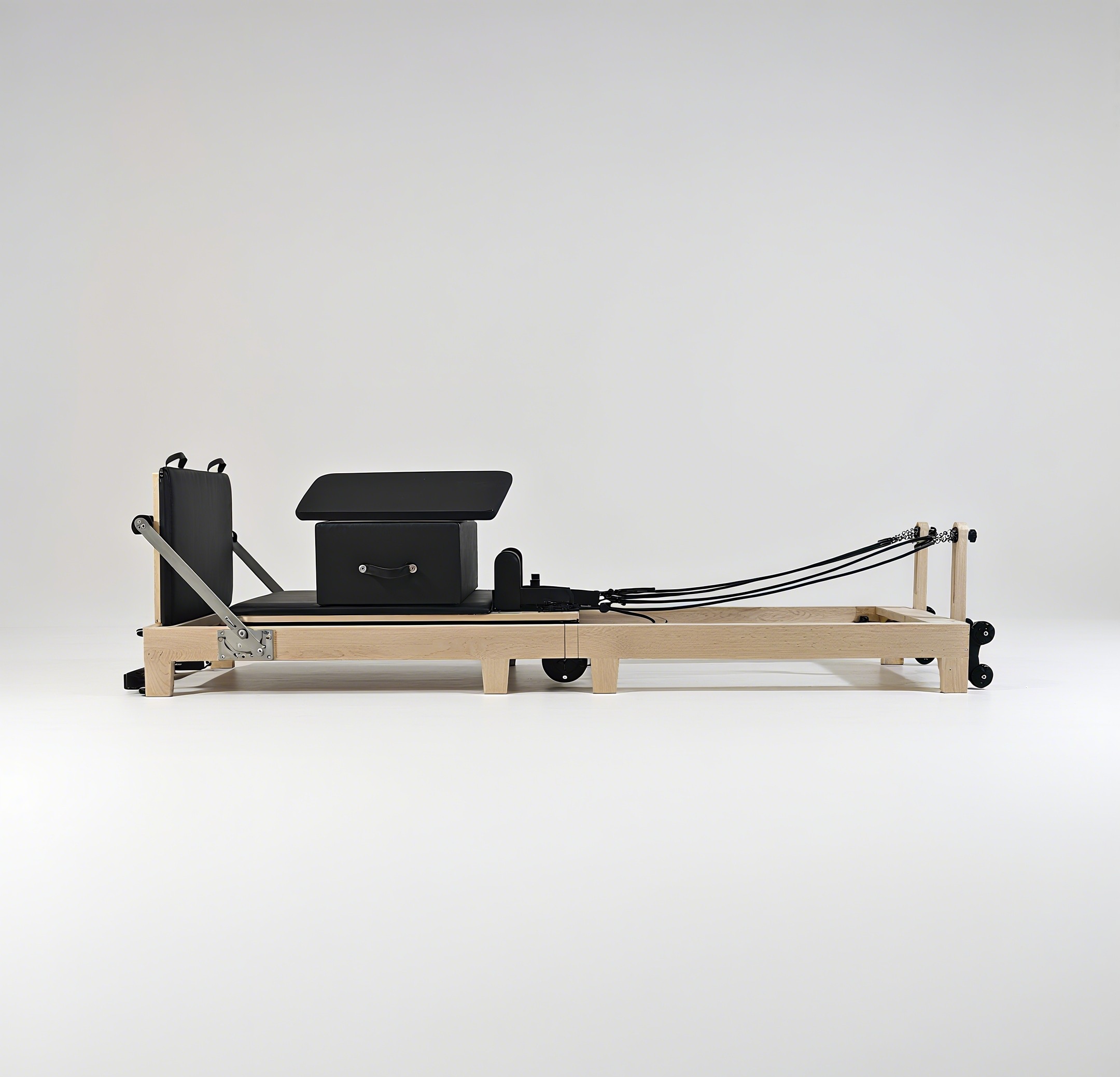 Pilates & Yoga Knokke - Foldable Maple Wood Pilates Reformer with
